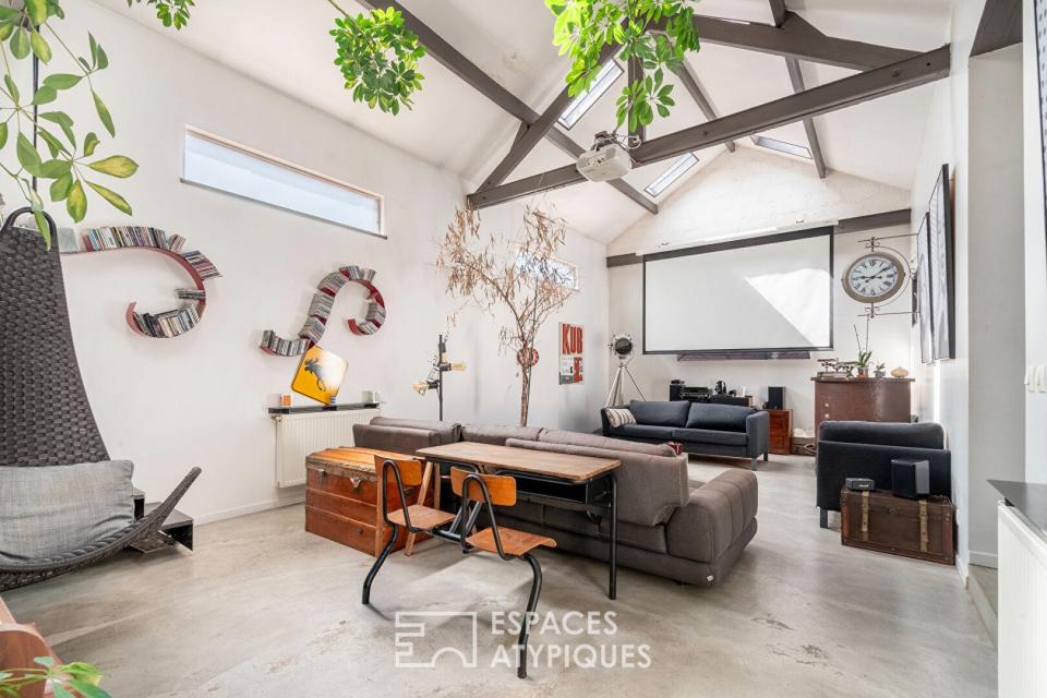 Maison d'architecte à l'esprit loft avec jardin