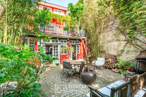 Maison avec cour pavée et jardin à l&rsquo;esprit japonisant