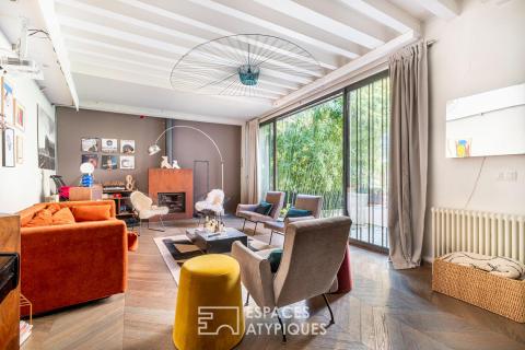 Maison à l&rsquo;esprit loft avec terrasse
