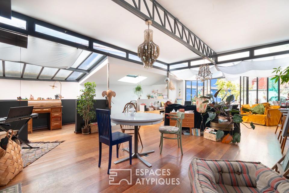 Loft avec terrasse dans un ancien atelier