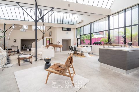 Loft avec terrasse dans anciens ateliers