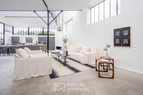 Loft avec terrasse dans anciens ateliers
