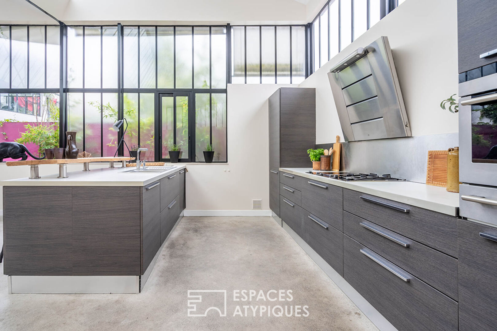 Loft avec terrasse dans anciens ateliers