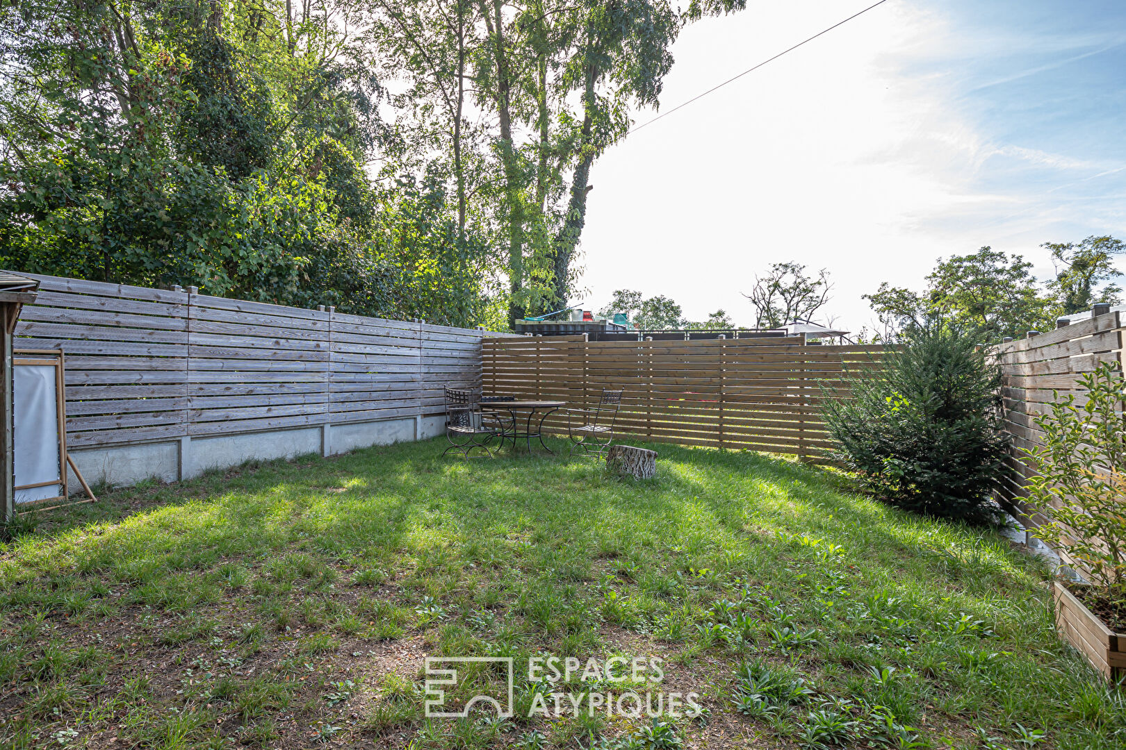 Triplex inversé avec jardin dans une ancienne chaudronnerie