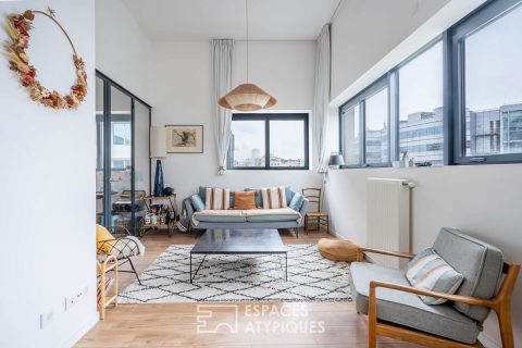 Contemporary loft with cathedral living room