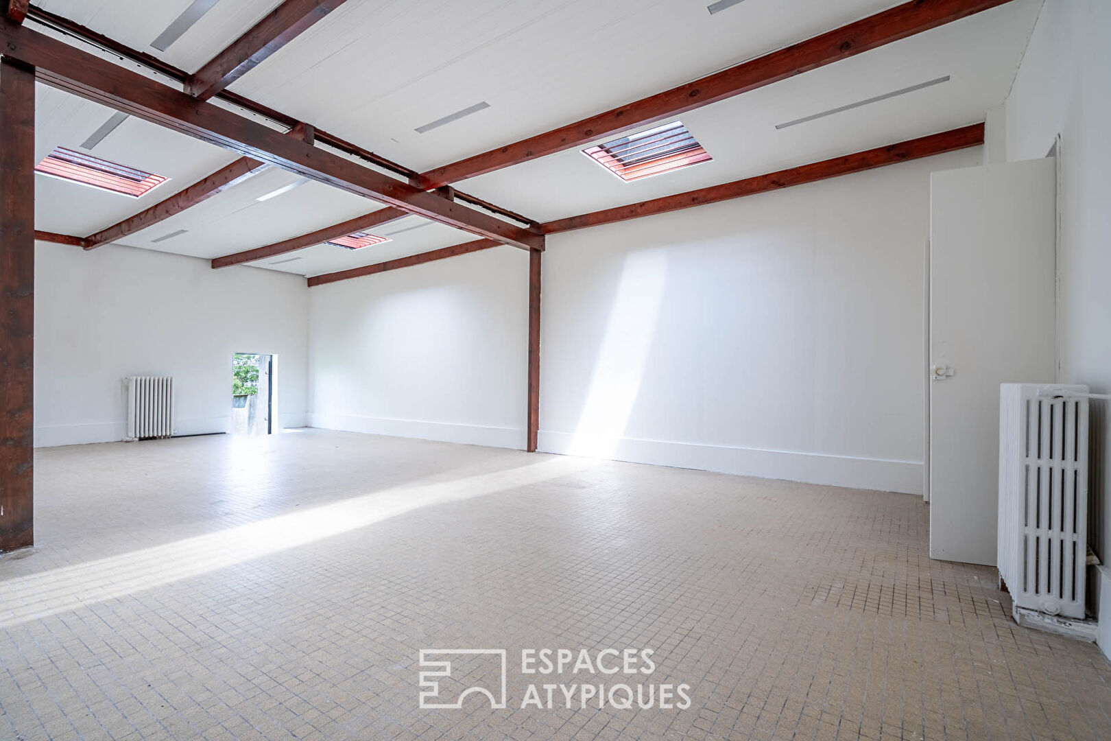 Maison avec jardin et plateau de 100m2 en rez de jardin