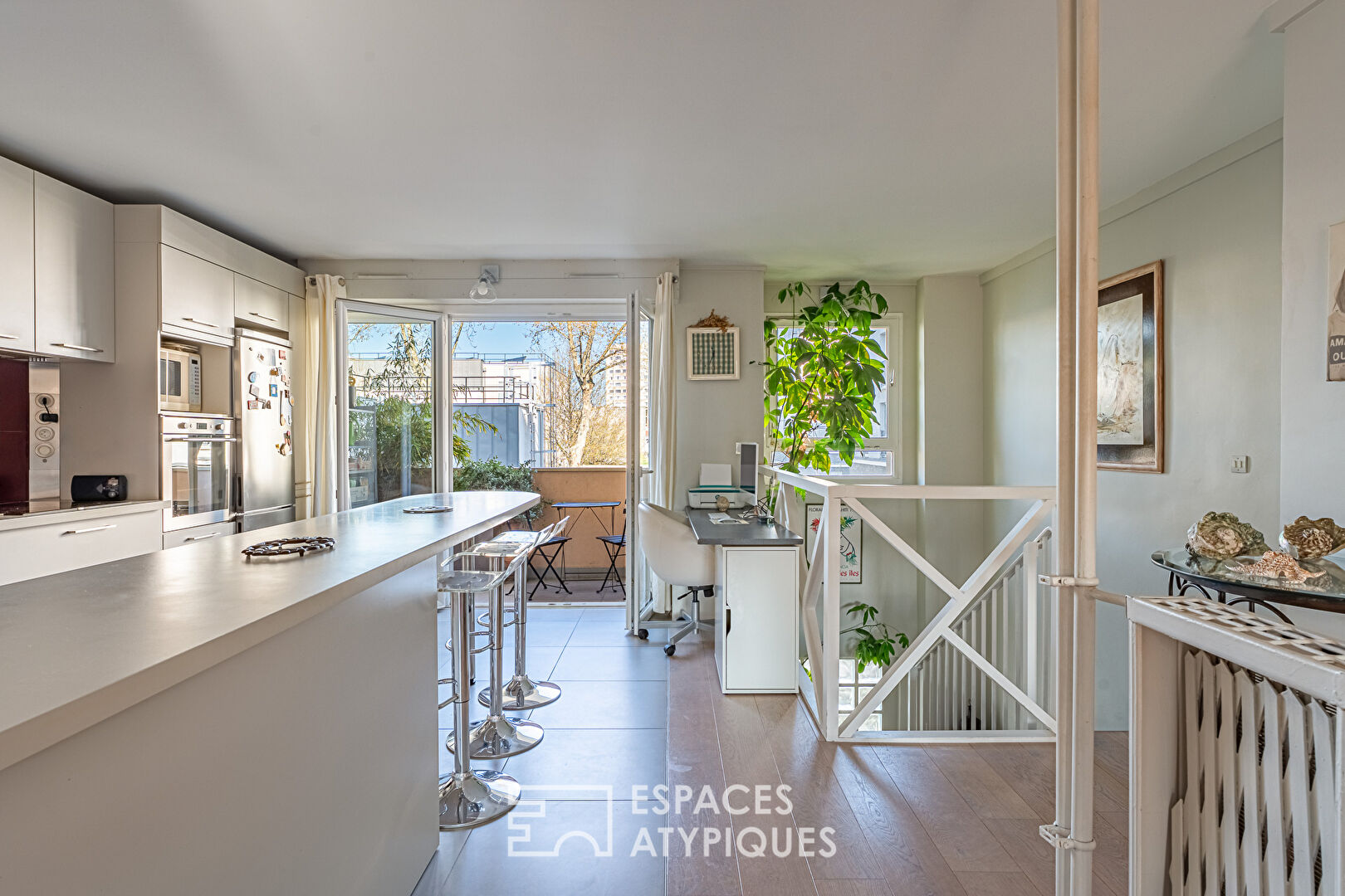 Duplex inversé traversant avec balcon