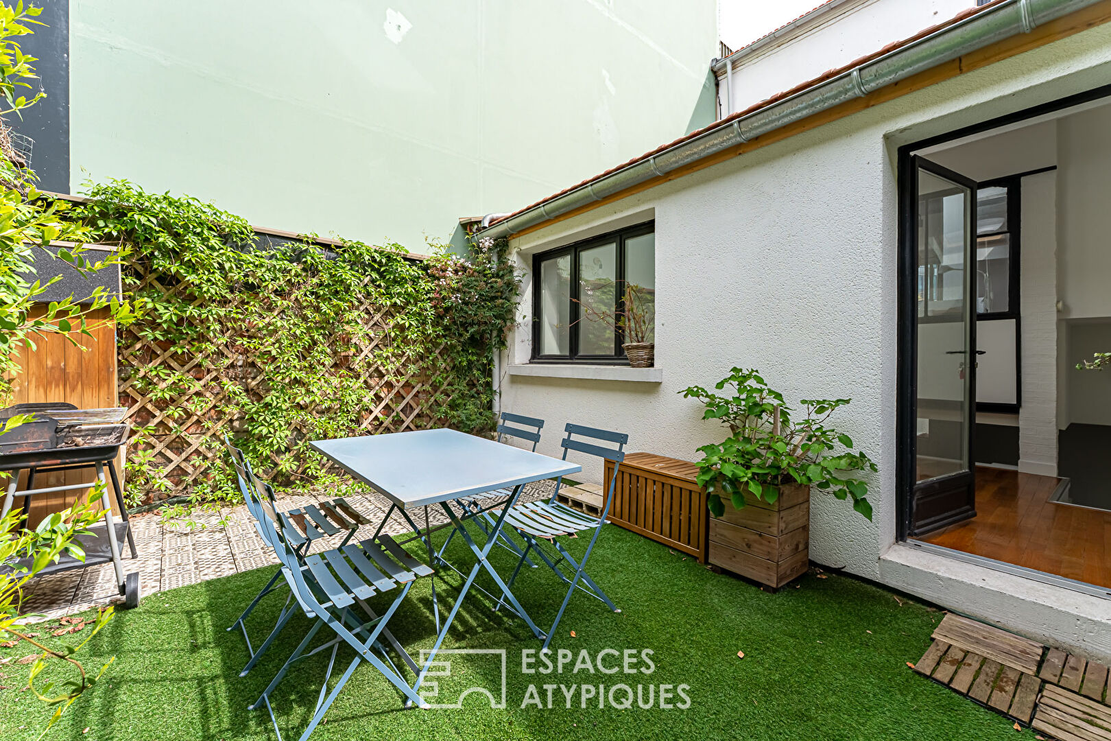 Maison réinventée avec jardin secret, au coeur d’Asnières