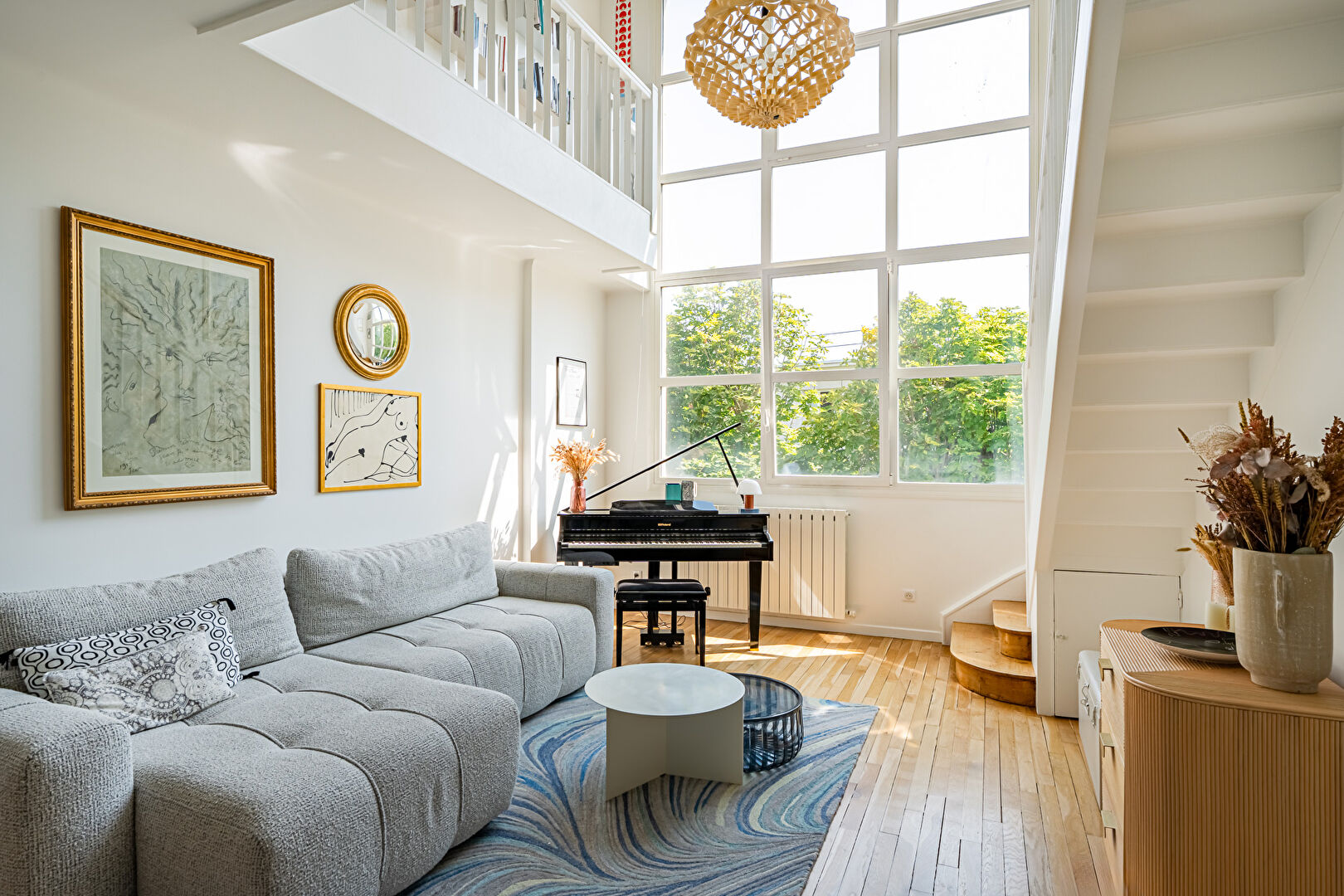 Family artist’s studio bathed in light and sheltered from view.