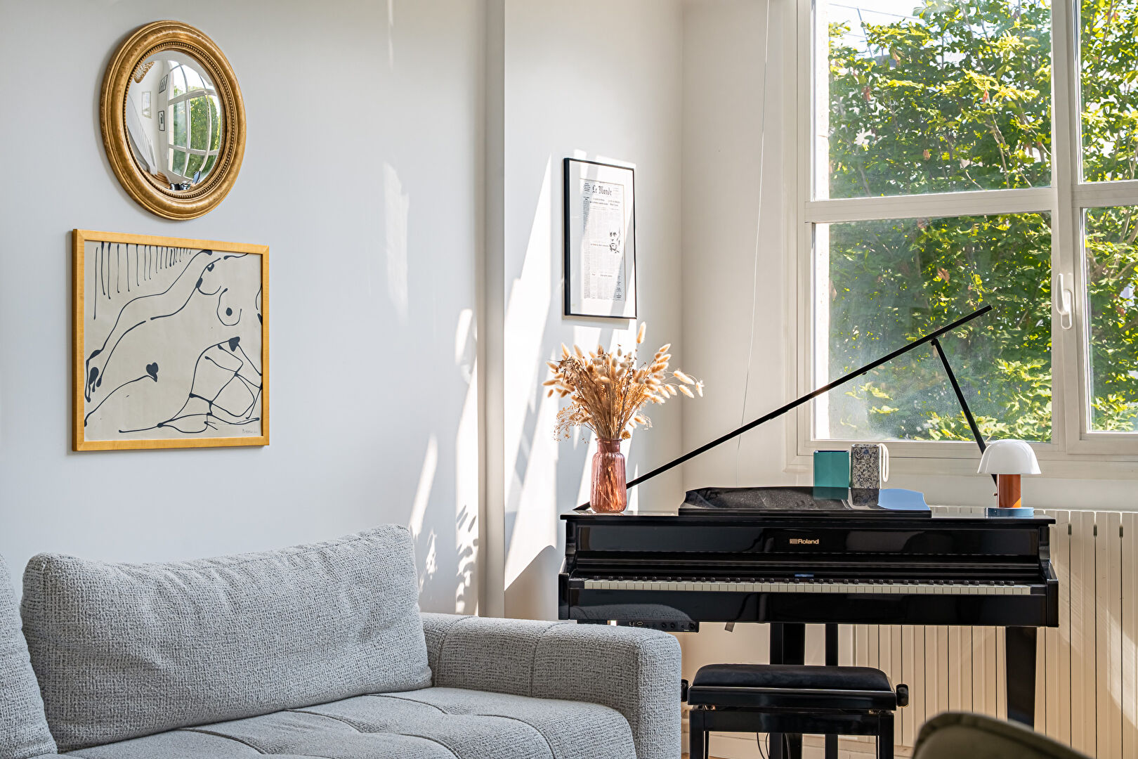 Family artist’s studio bathed in light and sheltered from view.