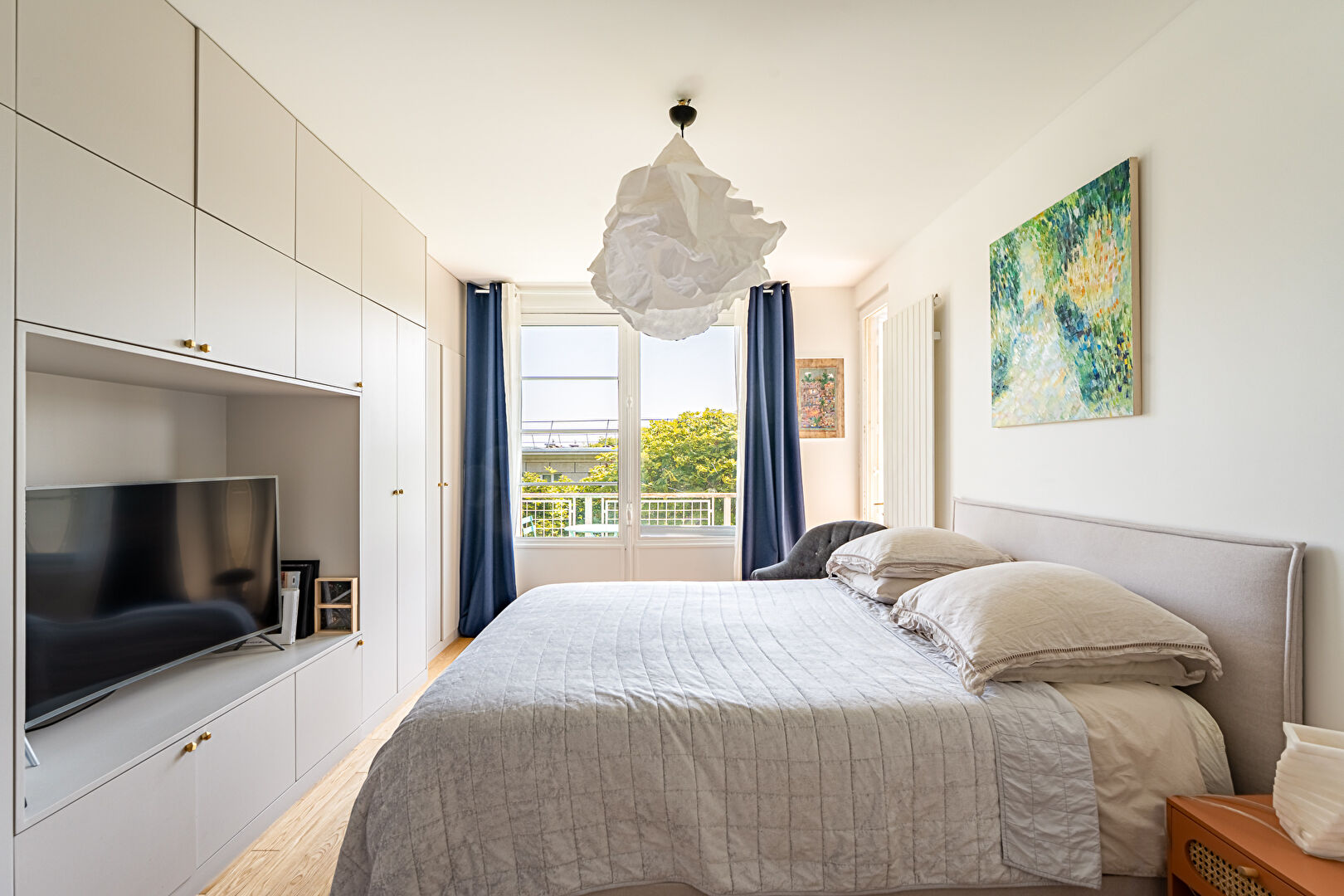 Family artist’s studio bathed in light and sheltered from view.
