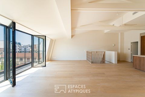 Top floor duplex with balconies and unobstructed view