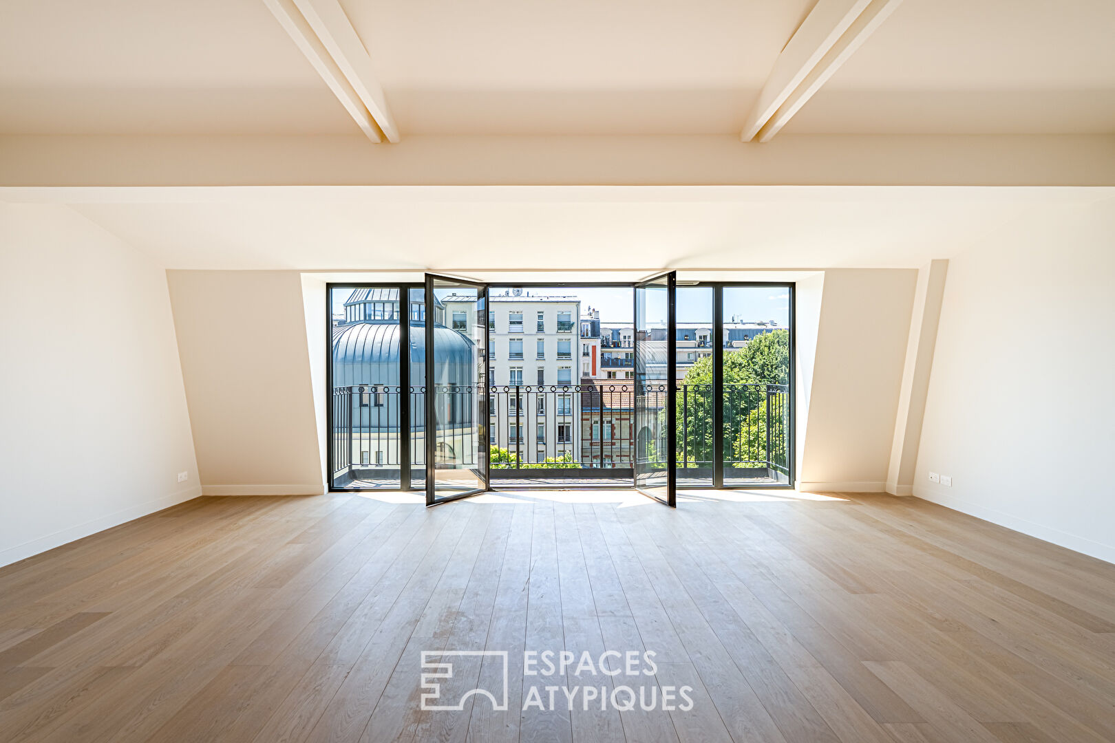 Top floor duplex with balconies and unobstructed view