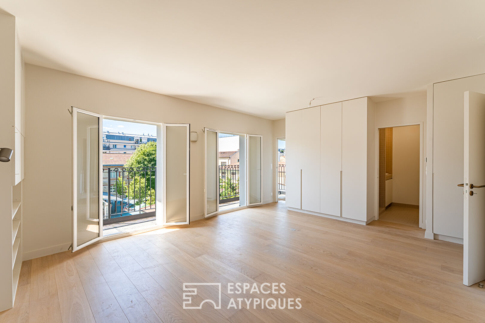 Top floor duplex with balconies and unobstructed view