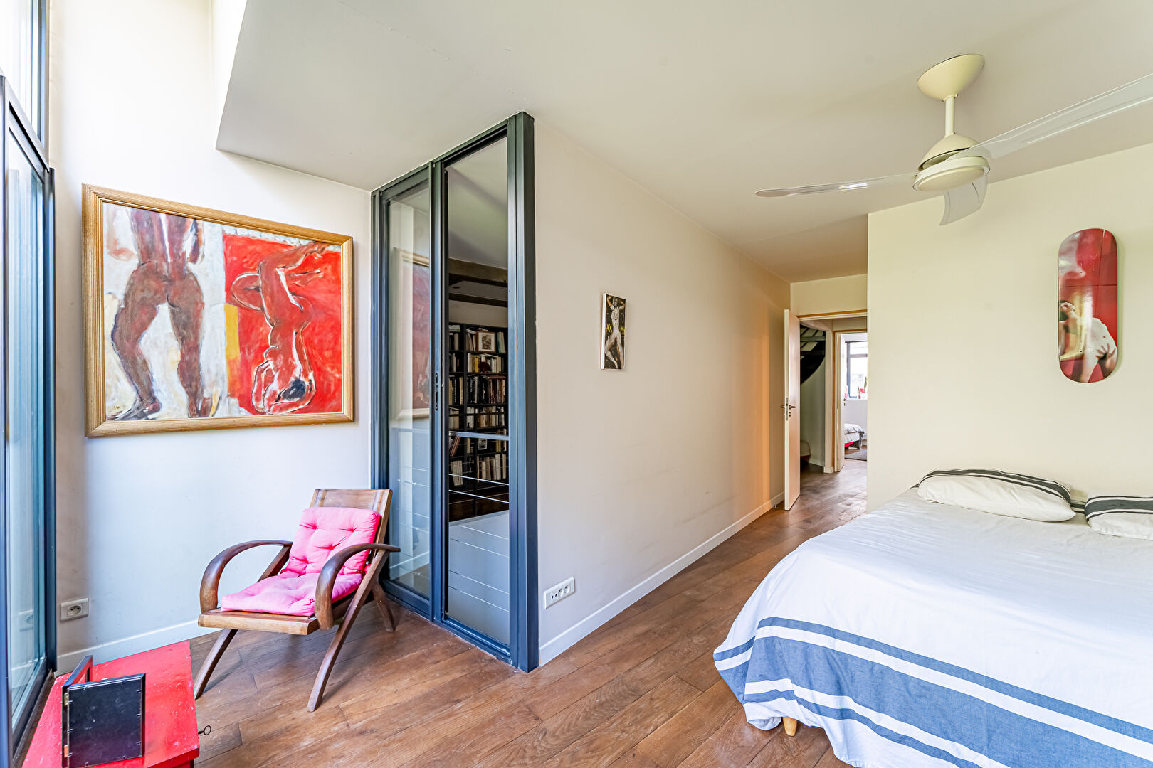 Architect-designed triplex with a house-style feel and a lush garden