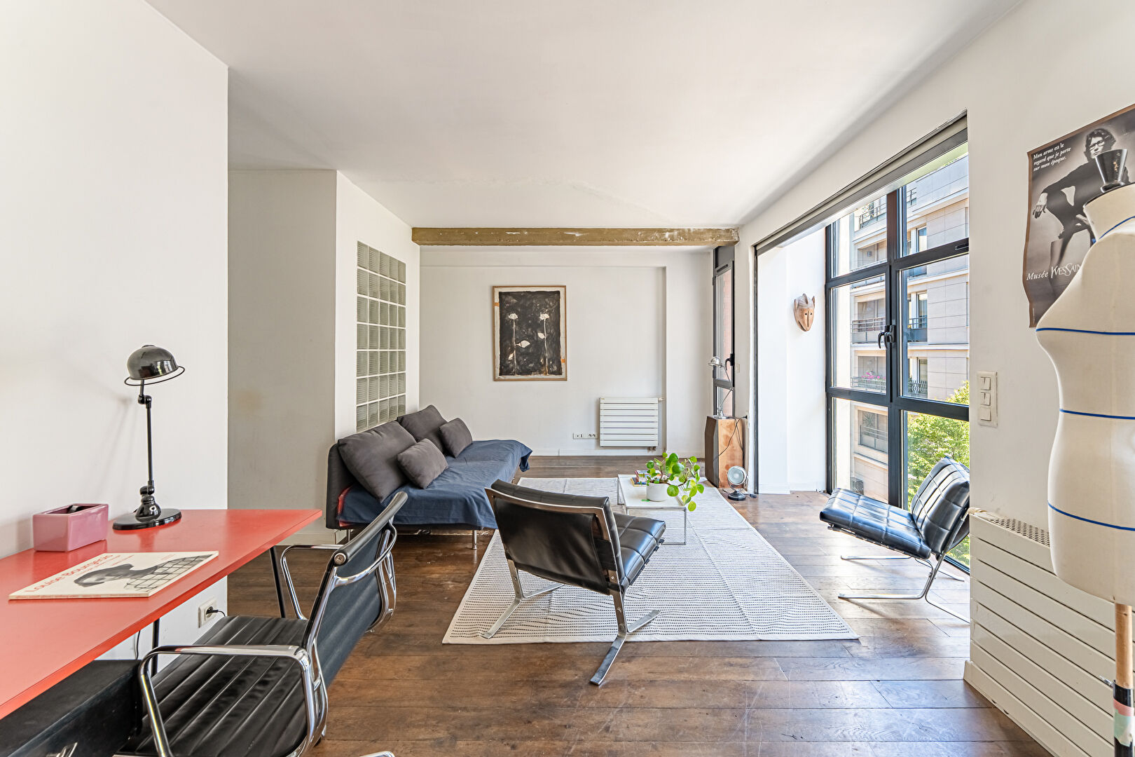 Architect-designed triplex with a house-style feel and a lush garden