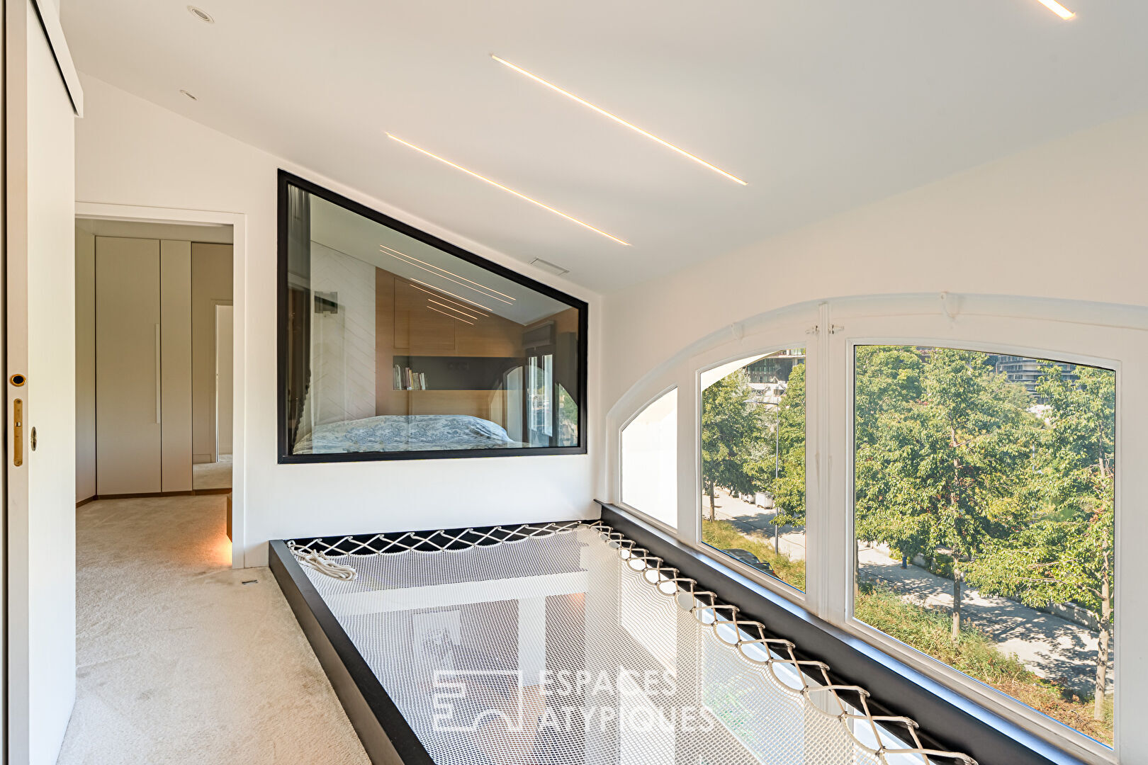 Duplex contemporain avec balcon dans un ancien hôtel particulier, aux portes de l’Île Seguin