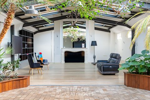 Maison-loft aux volumes exceptionnels, avec verrière et végétation intérieure