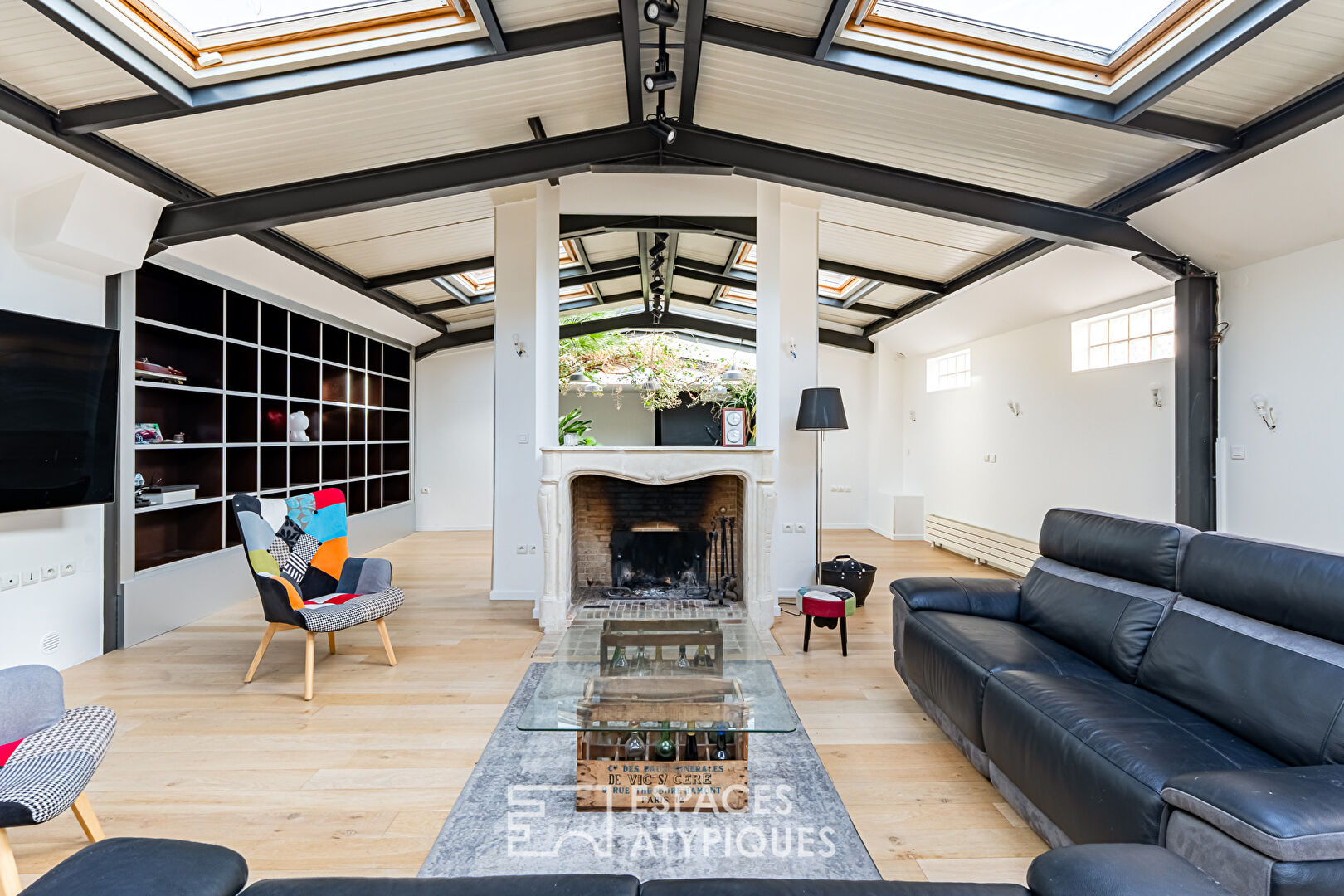 Maison-loft aux volumes exceptionnels, avec verrière et végétation intérieure