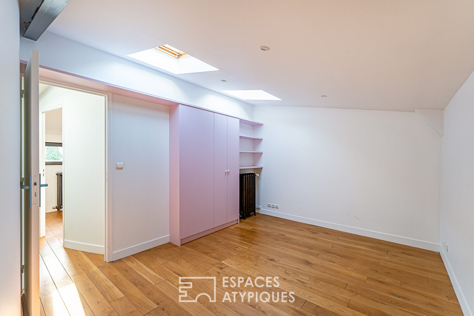 Maison-loft aux volumes exceptionnels, avec verrière et végétation intérieure