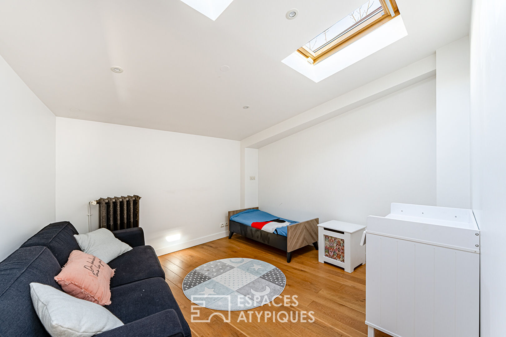 Maison-loft aux volumes exceptionnels, avec verrière et végétation intérieure