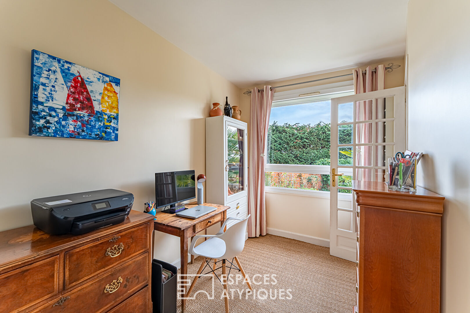 Lumineux premier étage avec balcon sur espace vert