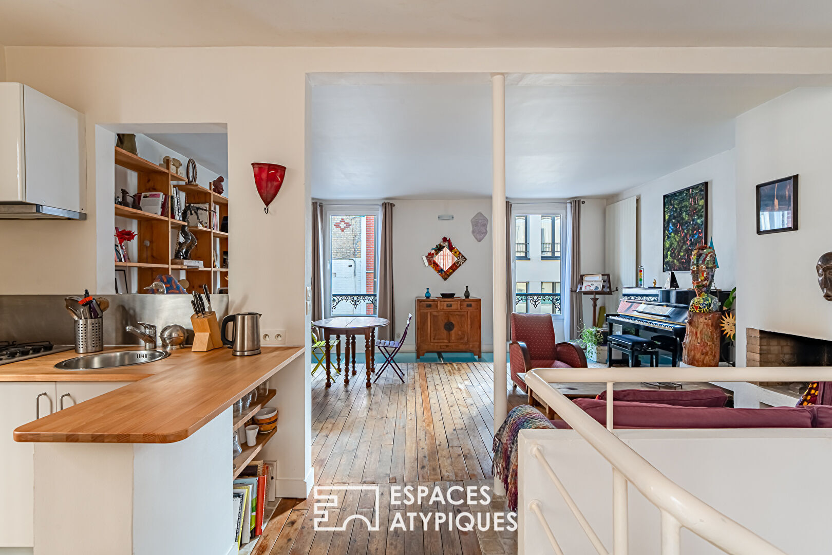 Duplex inversé comme une maison au coeur de Boulogne.