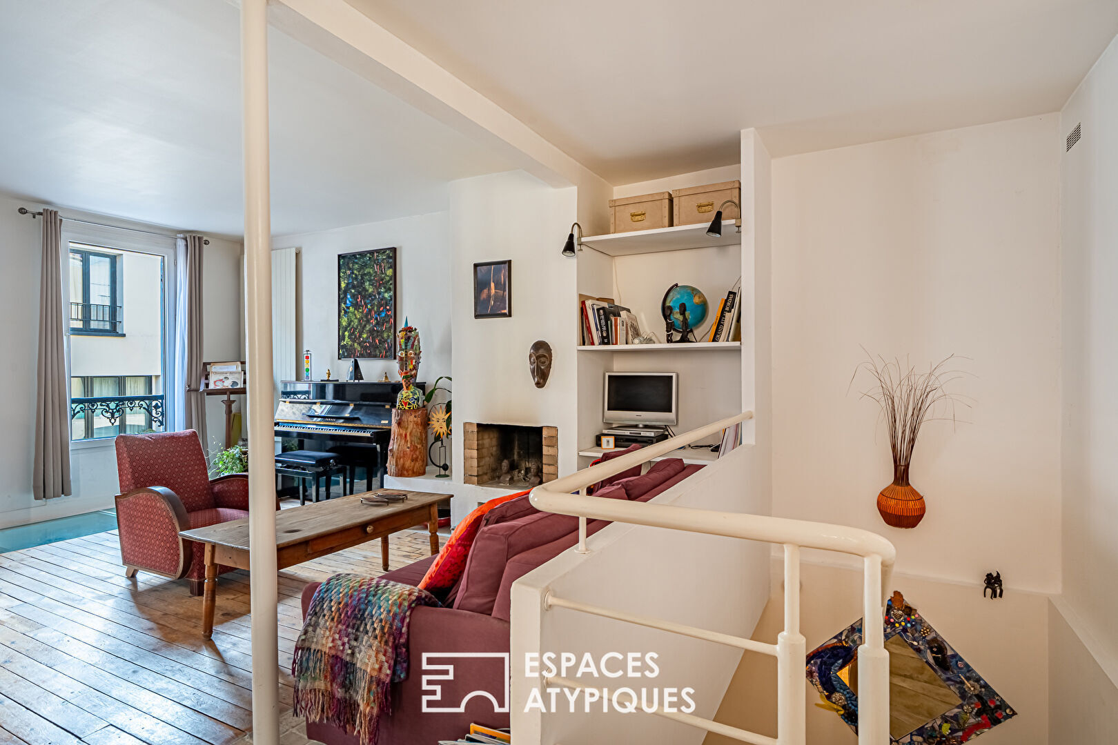 Duplex inversé comme une maison au coeur de Boulogne.