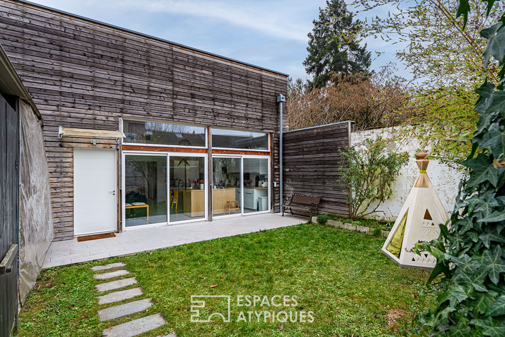 Loft avec jardin en coeur de ville