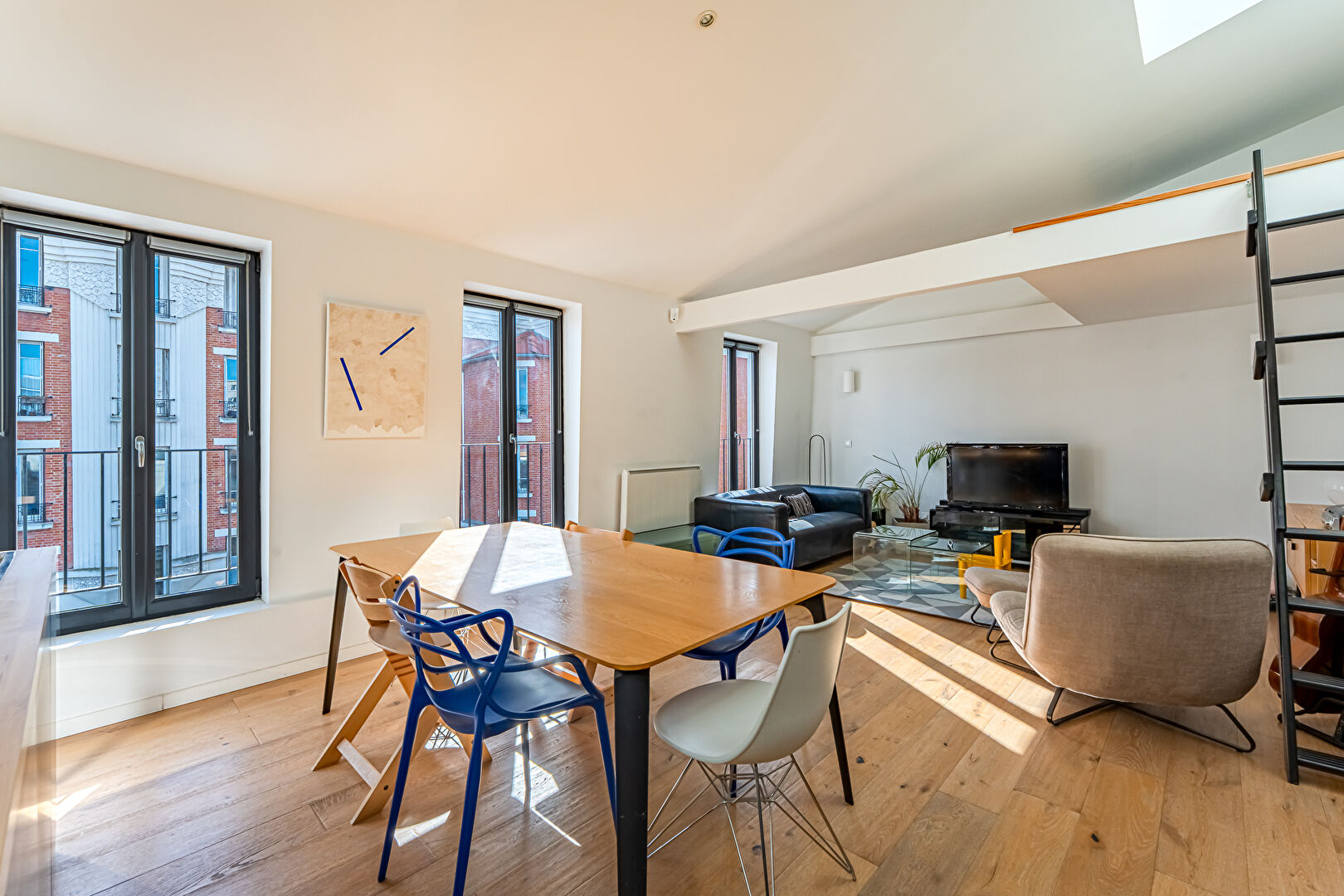 Duplex esprit loft avec terrasse et garage au dernier étage