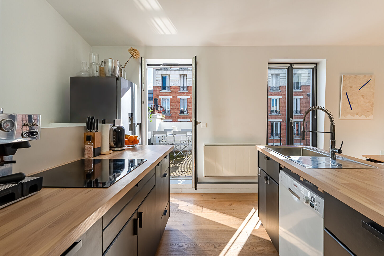 Duplex esprit loft avec terrasse et garage au dernier étage