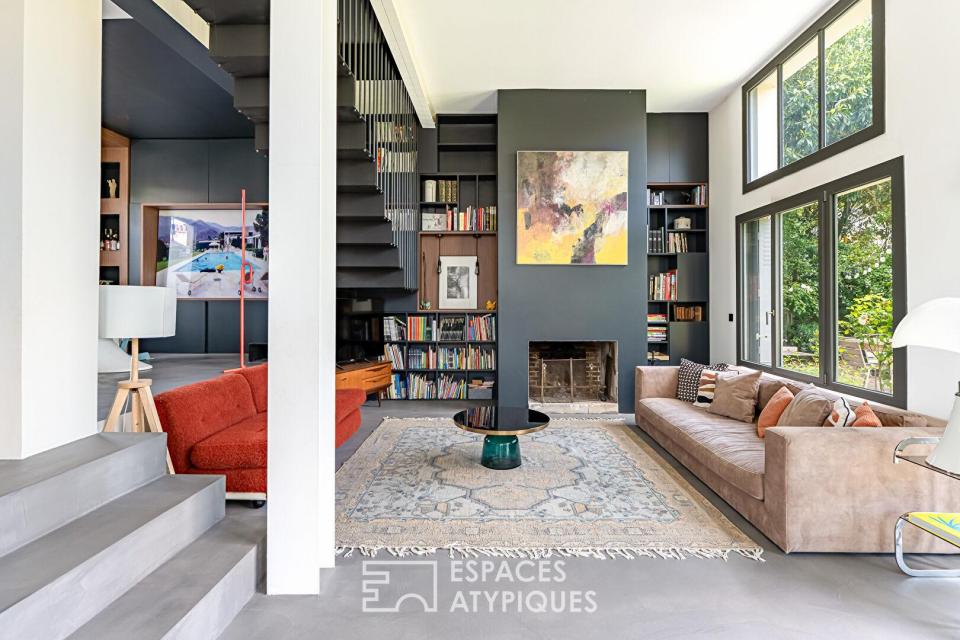 Maison transformée esprit loft avec terrasse et jardin