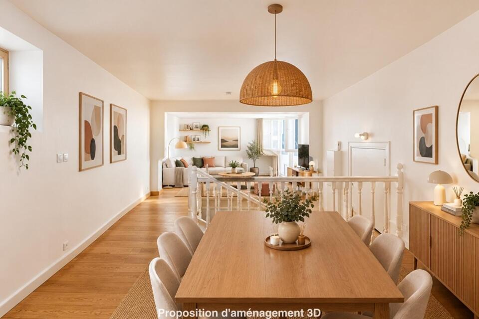 Duplex inversé en cour anglaise arborée, au coeur de l'île de la Jatte .