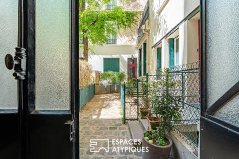 Duplex inversé en cour anglaise arborée, au coeur de l&rsquo;île de la Jatte