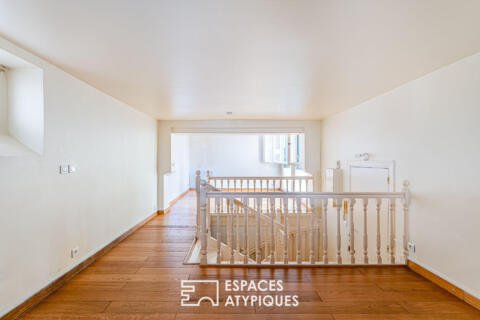 Duplex inversé en cour anglaise arborée, au coeur de l&rsquo;île de la Jatte