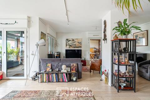 Appartement avec multiples terrasses face à la Seine et l’île Saint-Germain
