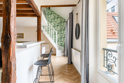 Dernier étage en duplex sous les toits dans un ancien relais de poste
