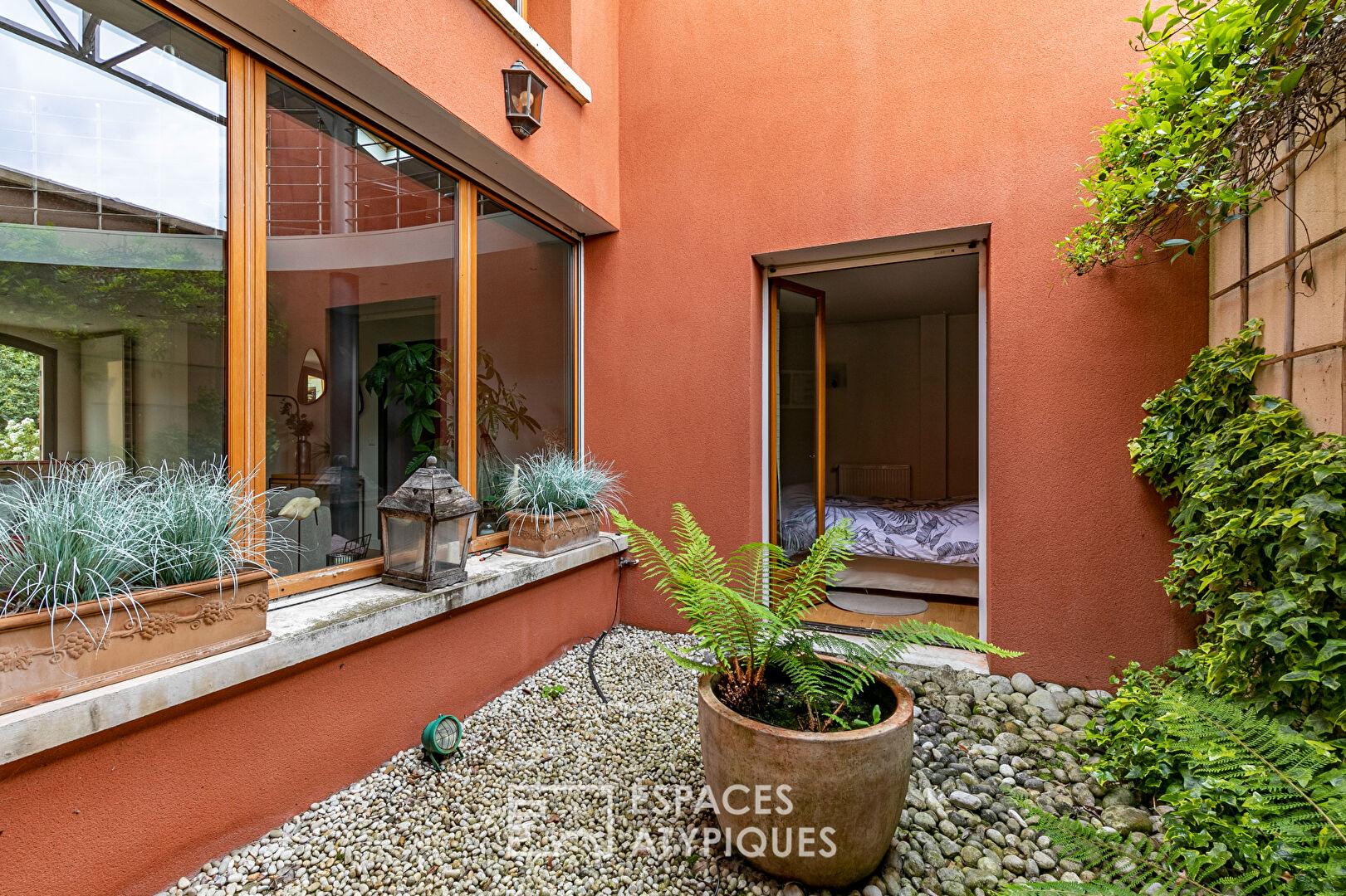 Former garage converted into a Loft with landscaped garden