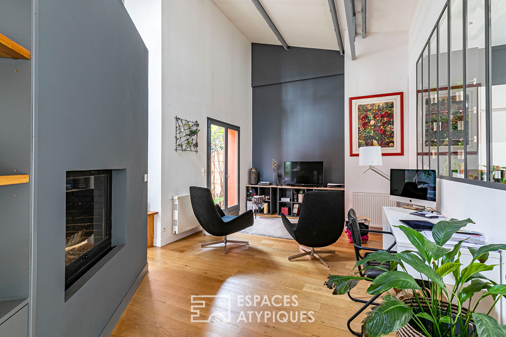 Former garage converted into a Loft with landscaped garden