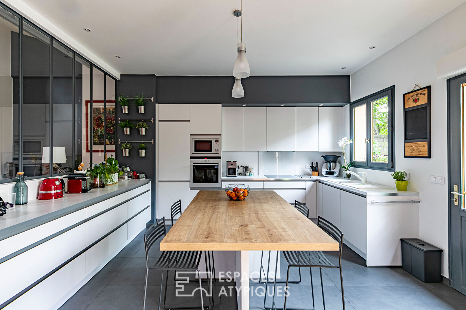 Former garage converted into a Loft with landscaped garden