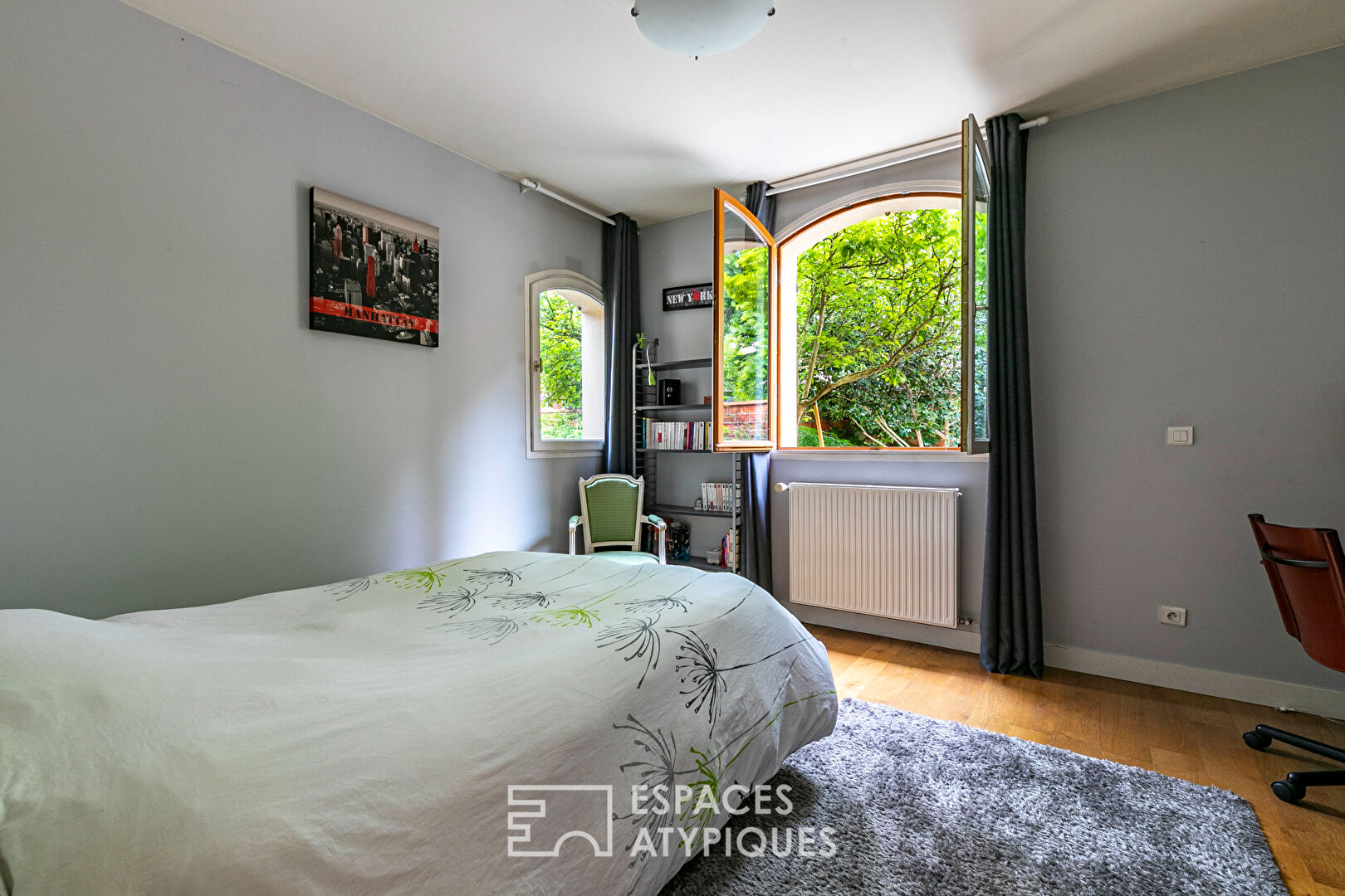 Former garage converted into a Loft with landscaped garden