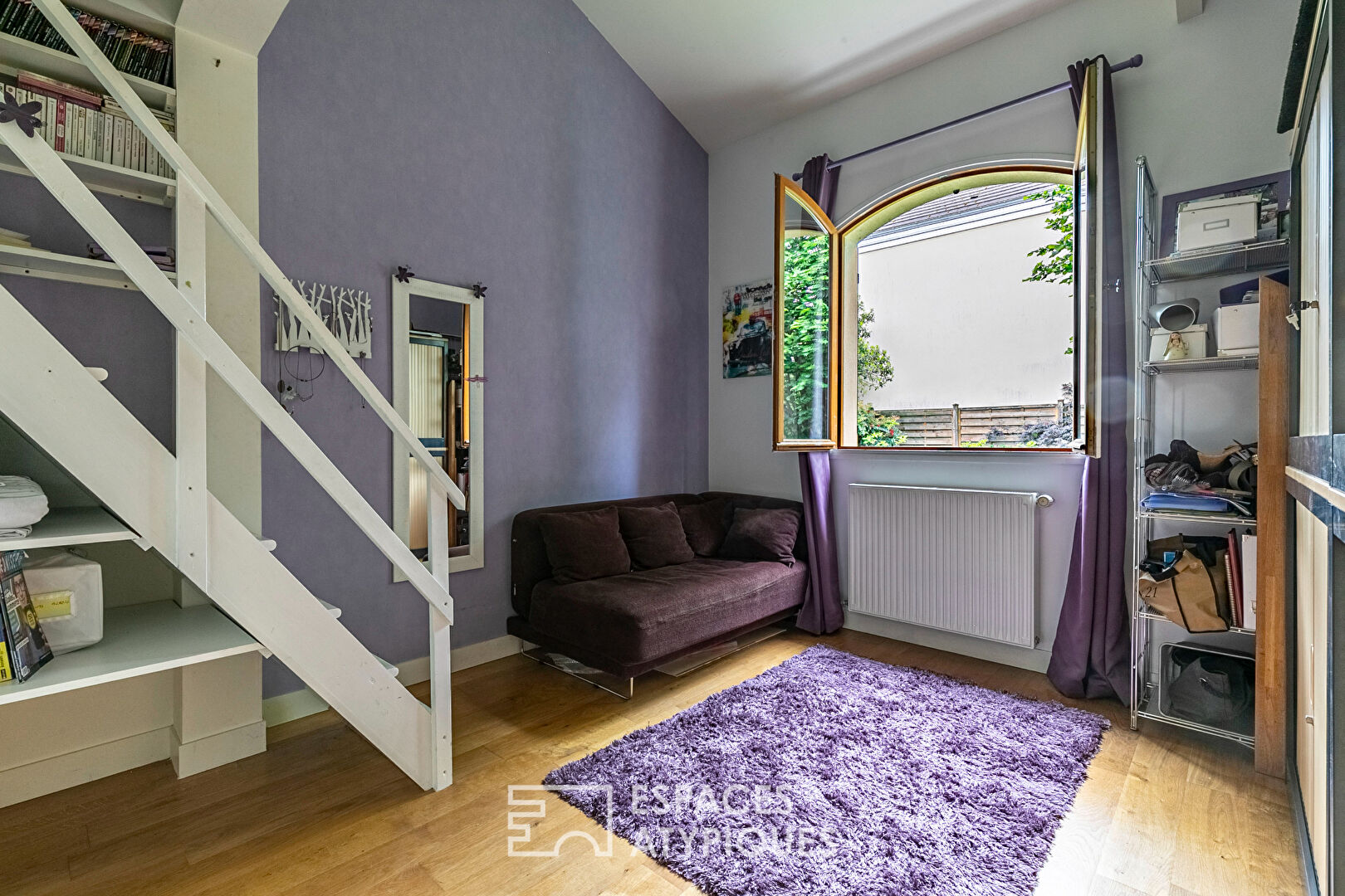 Former garage converted into a Loft with landscaped garden