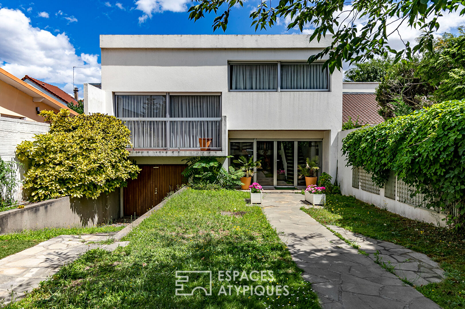 Architect house with patio and garden