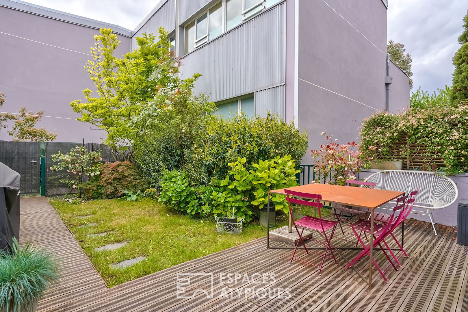 Duplex et son jardin dans une ancienne imprimerie