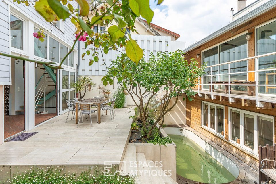 Maison familiale bardage bois et son annexe à Issy-les-Moulineaux