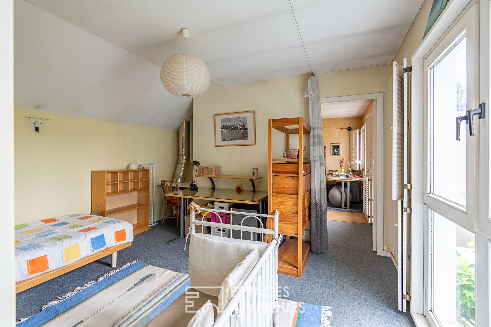 Maison familiale bardage bois et son annexe à Issy-les-Moulineaux