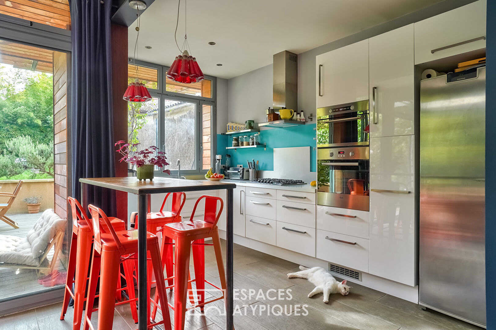 Maison d’architecte et son jardin dans une impasse privée