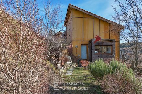 Maison bois bio-climatique dans un havre de paix