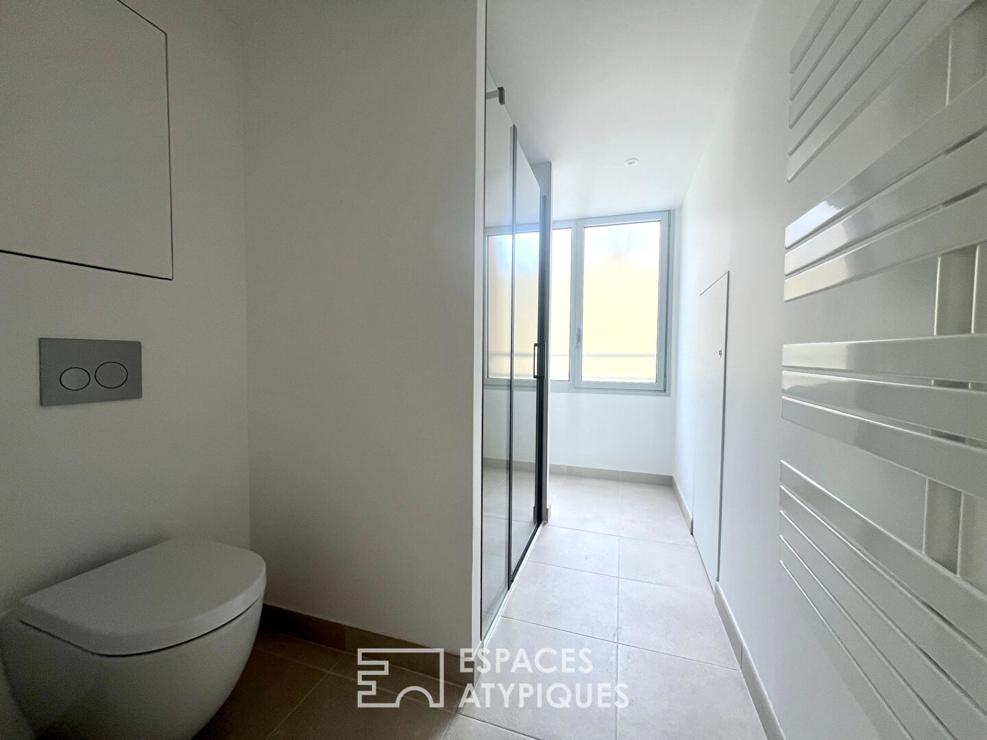 T3 duplex lumineux au style loft dans un lieu emblématique