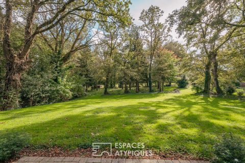 Set of two houses in its wooded park